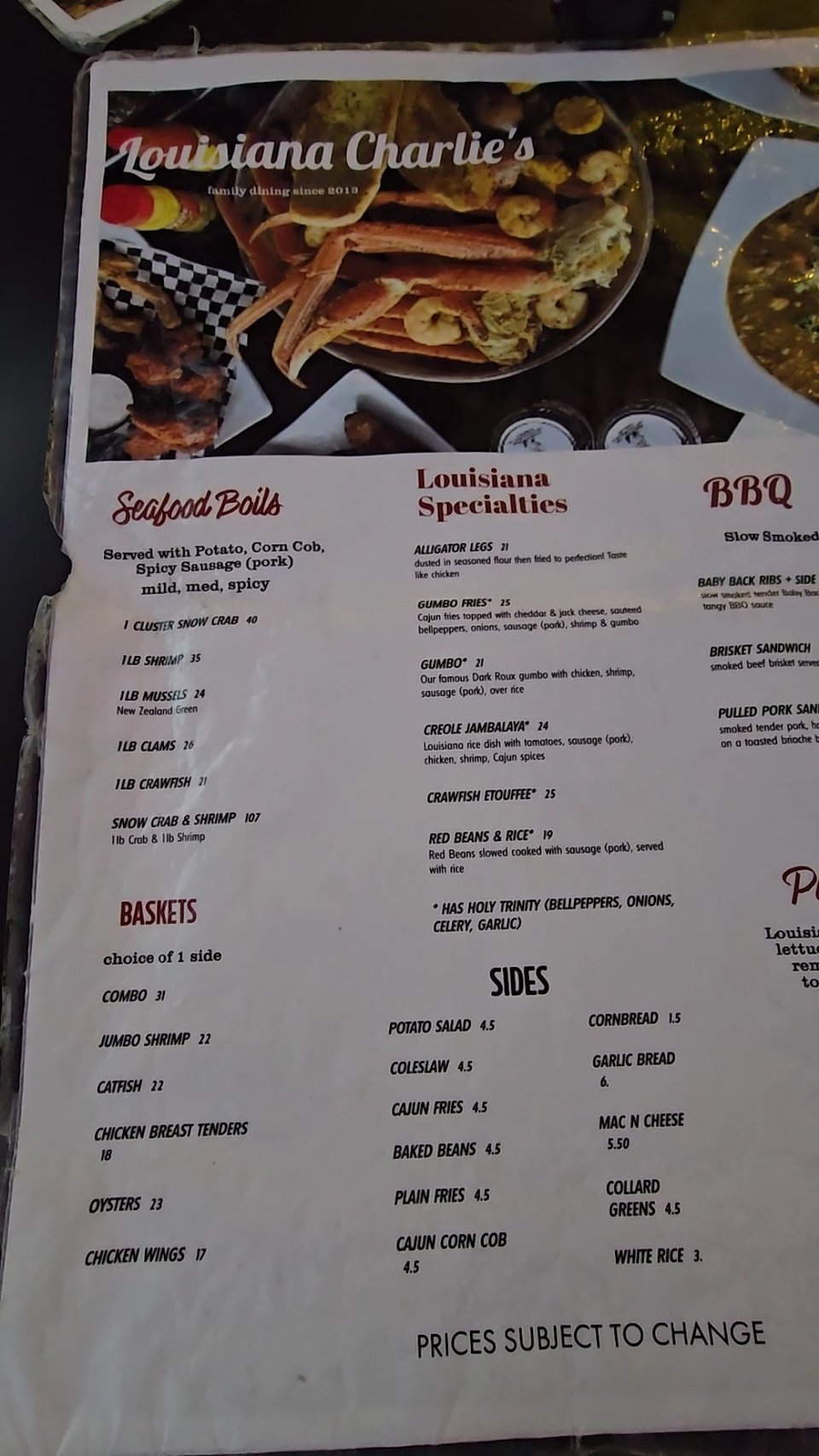 Printed menu with BBQ and seafood sections